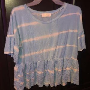 Size Medium only worn once. a little hole by the tag but it’s not noticeable.